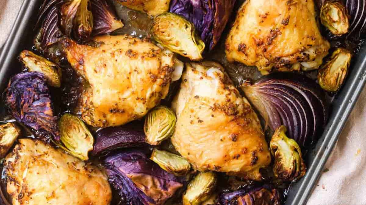 Sheet Pan Chicken Thighs with Cabbage & Brussels Sprouts.