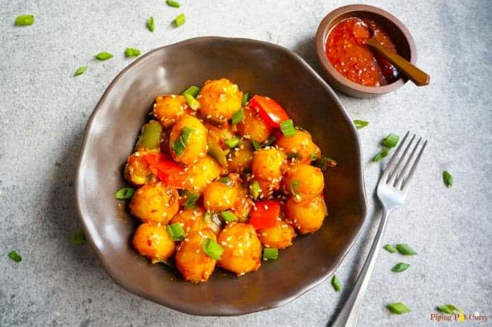 A bowl with garlic chili potatoes.