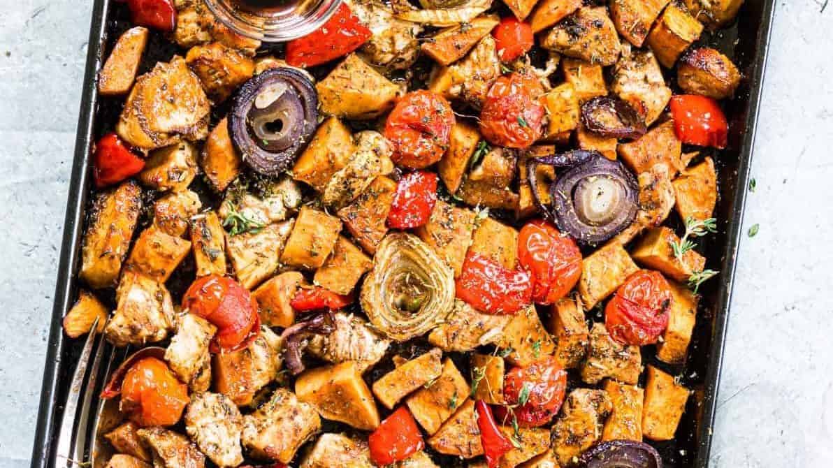 Sheet pan with chicken and veggies.