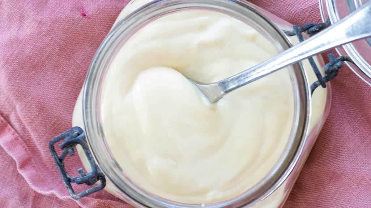 Dijonnaise in a glass jar.