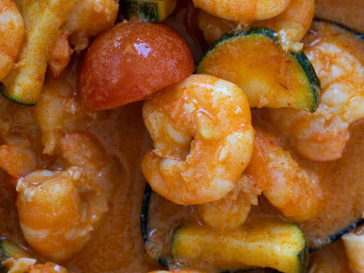 Shrimp curry in a skillet.